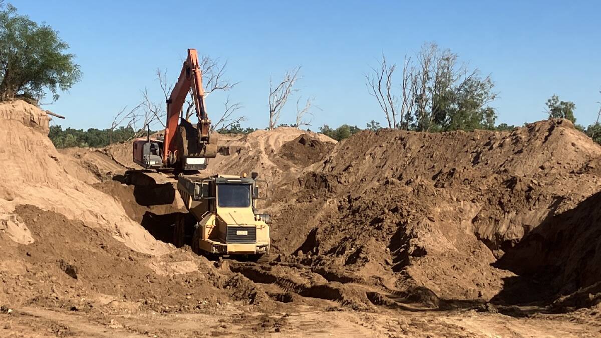 Council crews will work through the weekend to remove sand at the Leichhardt River crossing. Picture Carpentaria Shire Council.