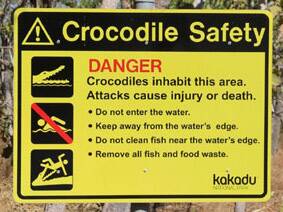 Parts of a Commonwealth funding boost for national parks is set to be used to restore or replace crocodile warning signs in the Top End. 