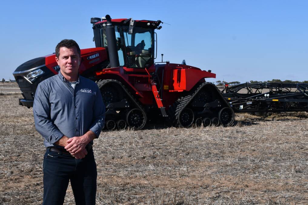 Case IH product specialist Justin Bryant with the Steiger 715 Quadtrac at Murray Bridge. Pictures by Paula Thompson