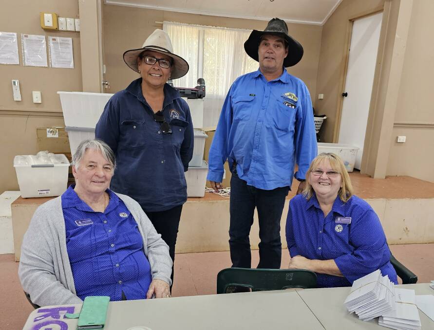 QCWA president Sheila Campbell (left) and QCWA state vice president Northern region Jeanette Weston (far right) with some of the locals from the Drovers Camp, Camooweal.