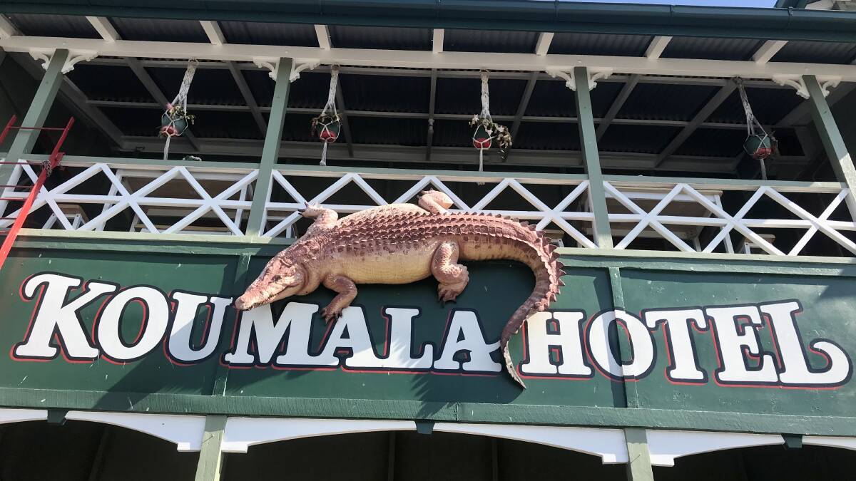 Koumala Hotel's eye-catching facade complete with its own life-like crocodile. Picture by Judith Maizey