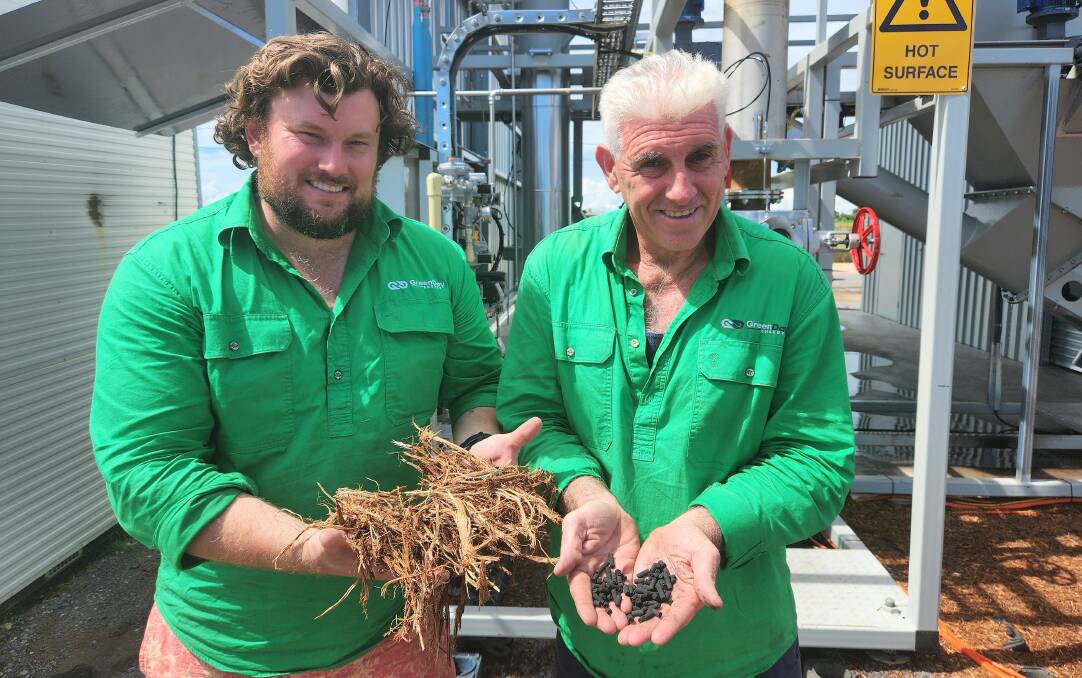 In happier times, Green Day Energy directors David Hutchinson and Brad Carswell with the raw material and biomass pellets formed from their pilot plant earlier in the year. Pictures: Sally Gall