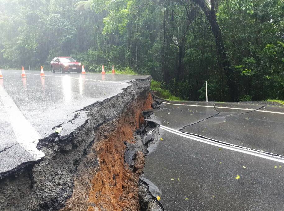 Roads including the Palmerston Highway were wrecked due to intense rainfall and flooding caused by Tropical Cyclone Jasper have impacted many small agricultural businesses as they now struggle to get produce to market. Picture: TMR 