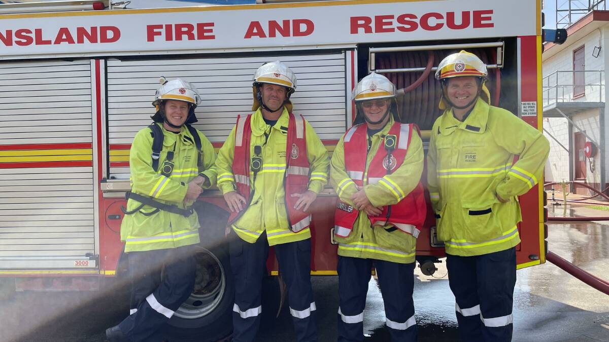 Atherton firefighters L-R Dylan Atkinson, Shane Teahan, Kent Bewick and Station Officer Jason Mather,take a break in between training and calls to suppress bushfires active in the region. picture by Alison Paterson