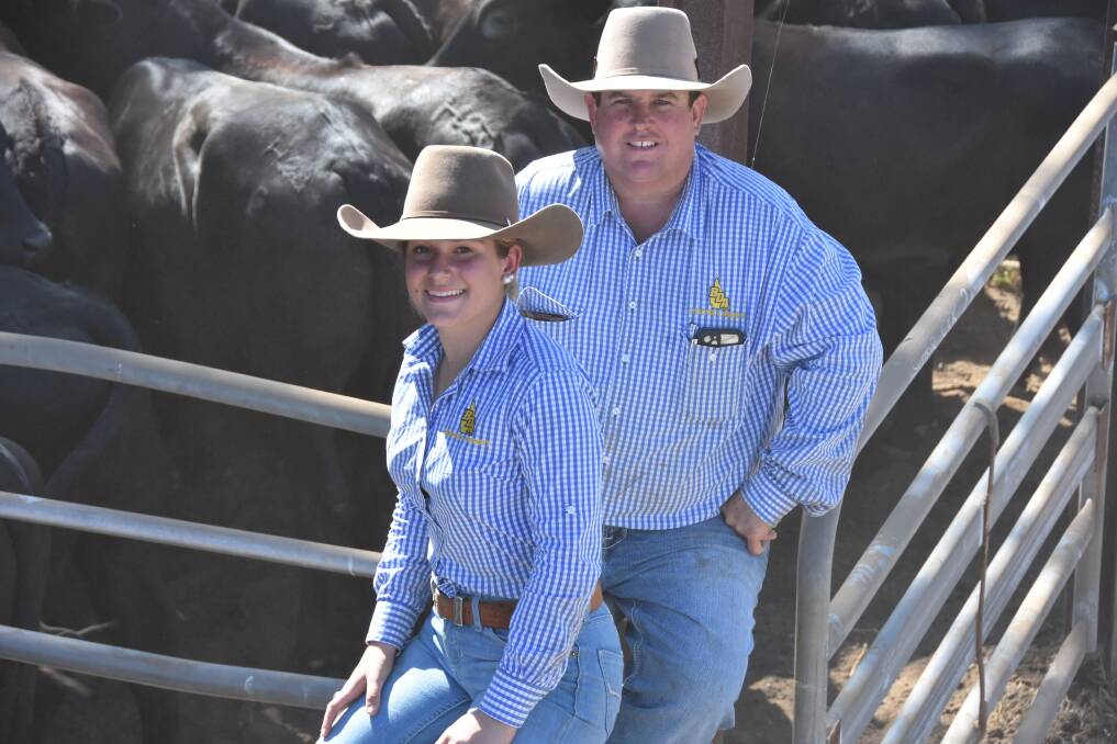Imogen Dawson and Joel Dawson from Brian Dawson Auctions sold a pen of steers for 306c/kg for Suttor Creek Pastoral, Glenden. Picture by Steph Allen.