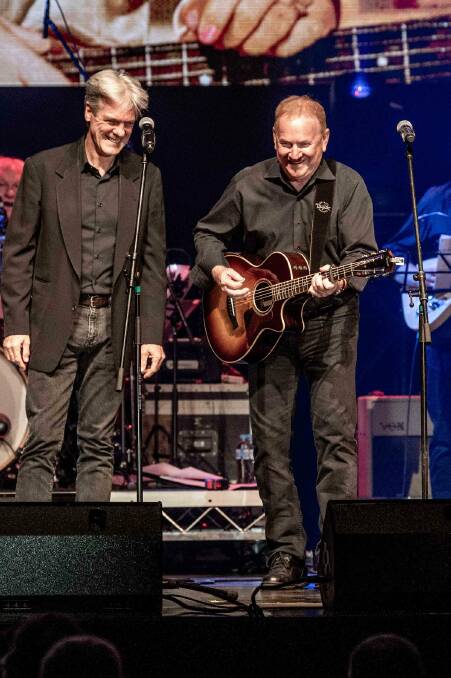 Graeme Connors performing on stage with Don English. Picture: Graeme Connors