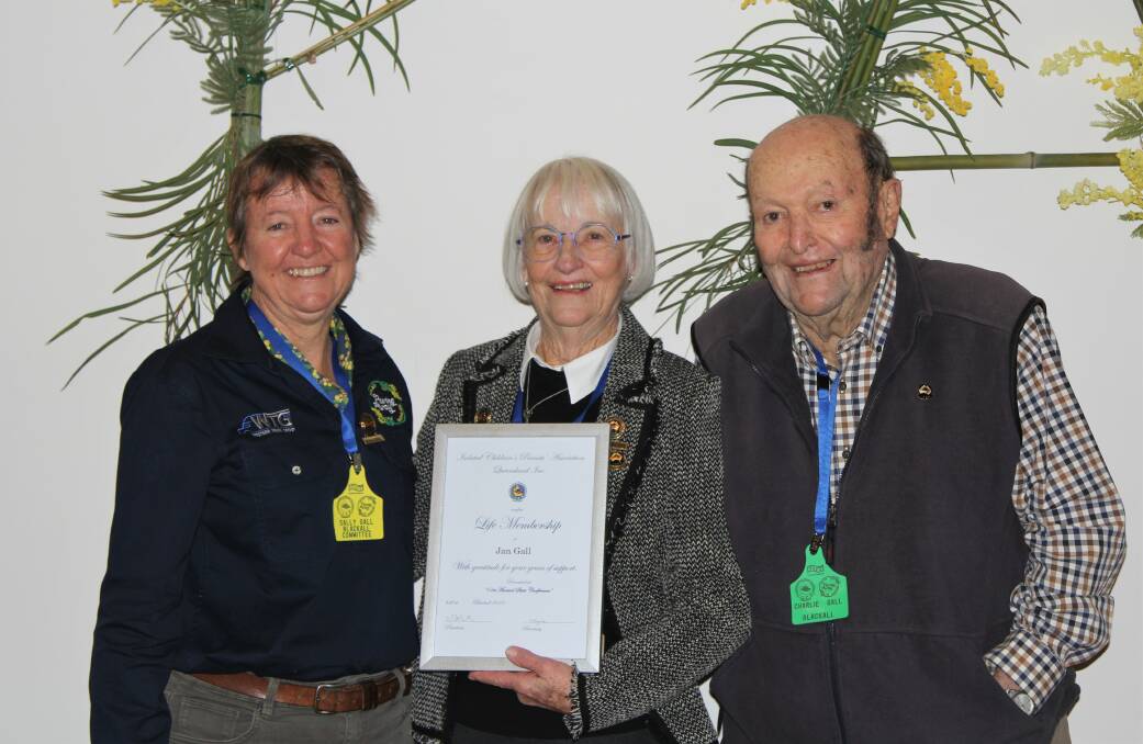 Jan Gall (centre) with daughter Sally and husband Charlie after receiving her Qld ICPA life membership at the ICPA Qld State Conference at Blackall in 2022. Picture: Supplied.