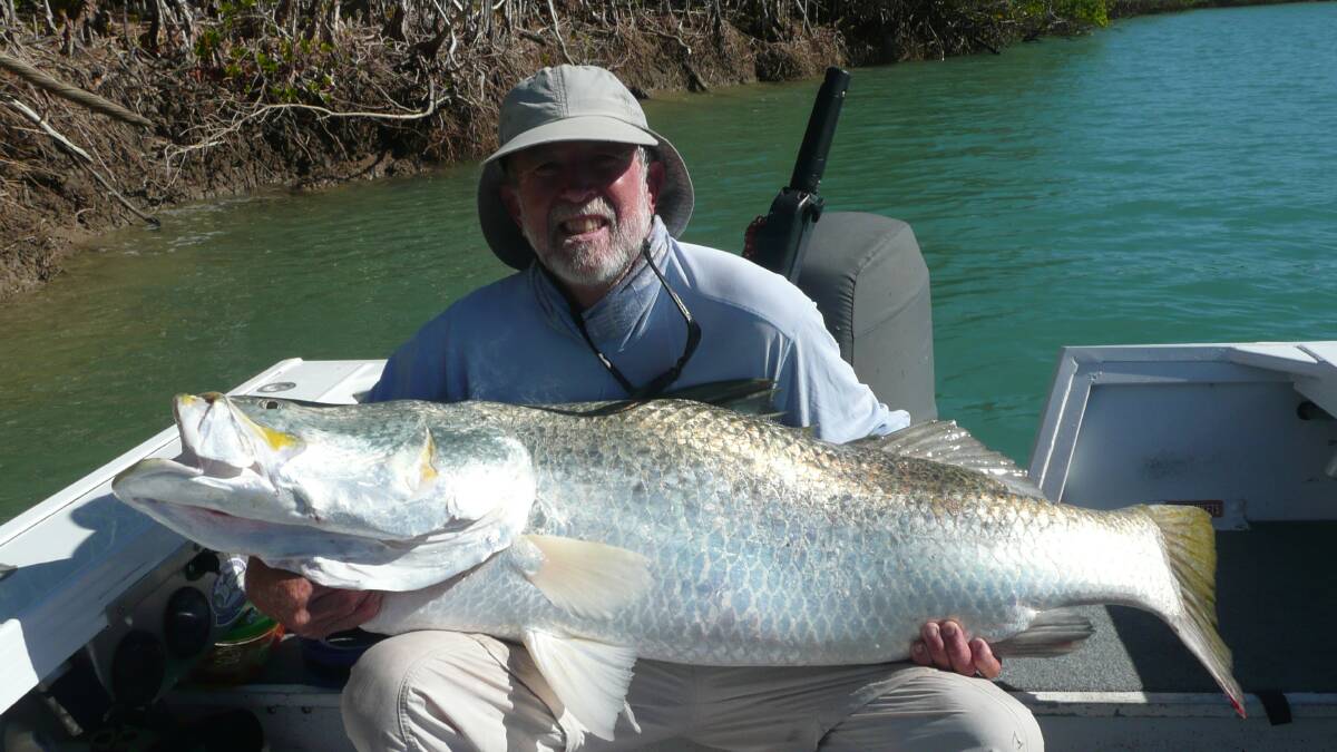 Legendary captain and fisherman Laurie Wright with a 132cm barramundi.