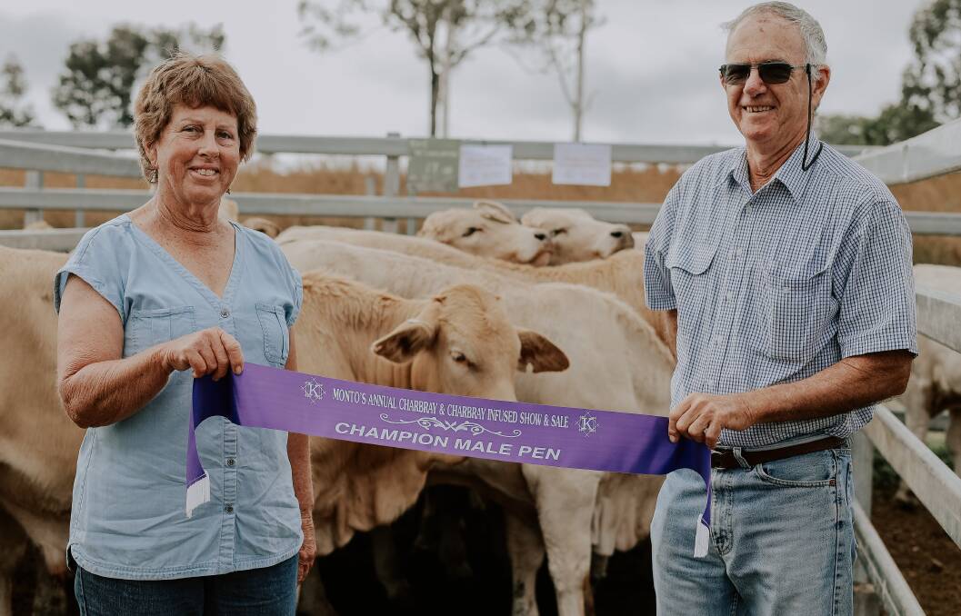 Rod and Tina McLaughlan with their champion pen of males. Picture by Sweet & Stower Photography.