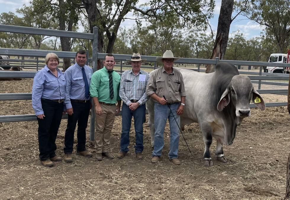 Sale top price bull, lot 25, with GDL's Tony and Beth Dwyer, Mackay, Nutrien Stud Stock's Dane Pearce, Rockhampton, buyer Ted Murphy, Tayglen Pastoral Co, Dysart, and vendor Brett Kirk, Hazelton Brahmans. Picture supplied. 