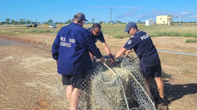Emergency services worked on fodder drops for isolated livestock. Photo: QFES.