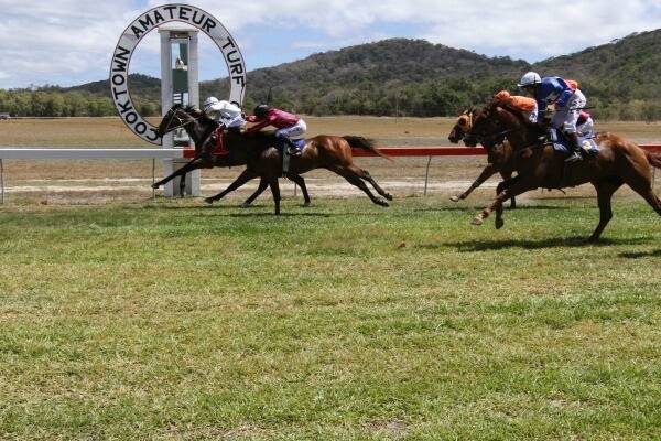 The Trevor Rowe-trained Clueless got home over Dadon by half a length. Clueless was ridden by Shane Pawsey who won the Jockey of the Day. Pawsey secured a trifecta on the day with wins in races two, three and four. Photo courtesy of Cooktown Local News.